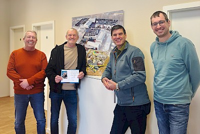 Abschied im Essener Büro: Ingo Buttler, Uwe Nuyken, Martin Will und Claus Ufermann (von links)
